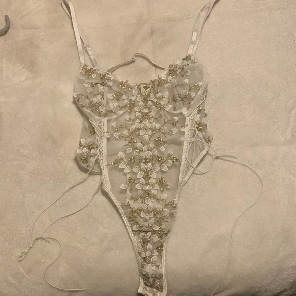 Gold and white sheer body suit